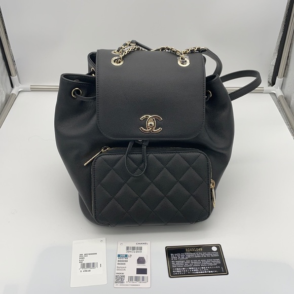 CHANEL Black Backpack with Gold Accents - Picture 1 of 6